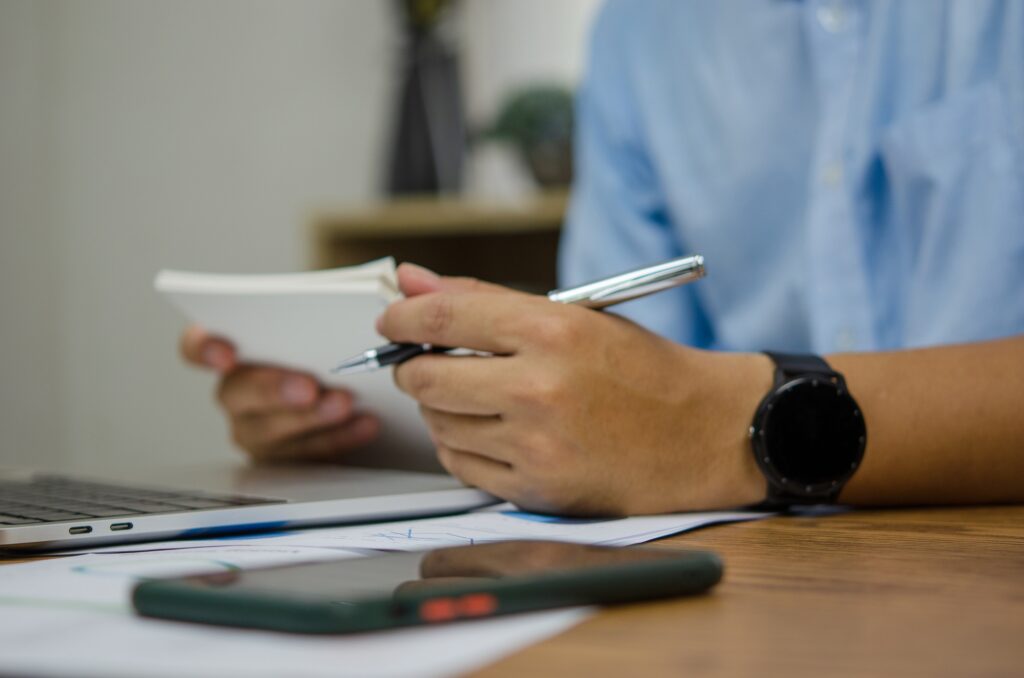 businessman reports data financial statements, market research or trading contracts, law contracts,
